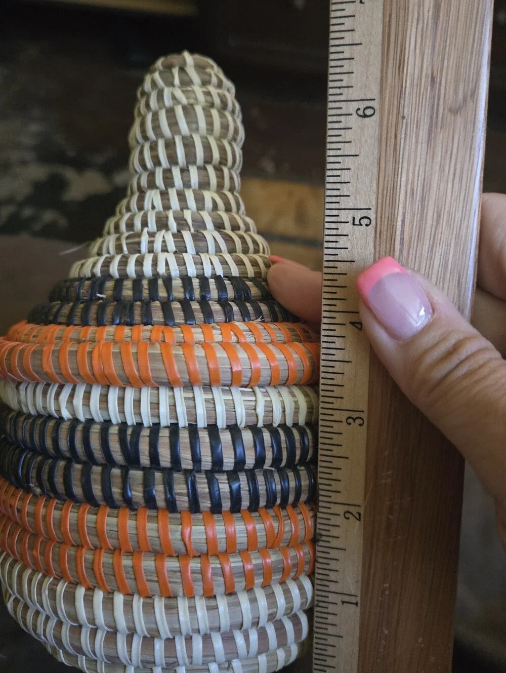 Handwoven Decorative Basket with Orange and Navy Accents